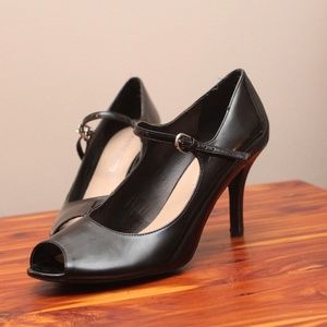 Black peep-top pumps with buckle
